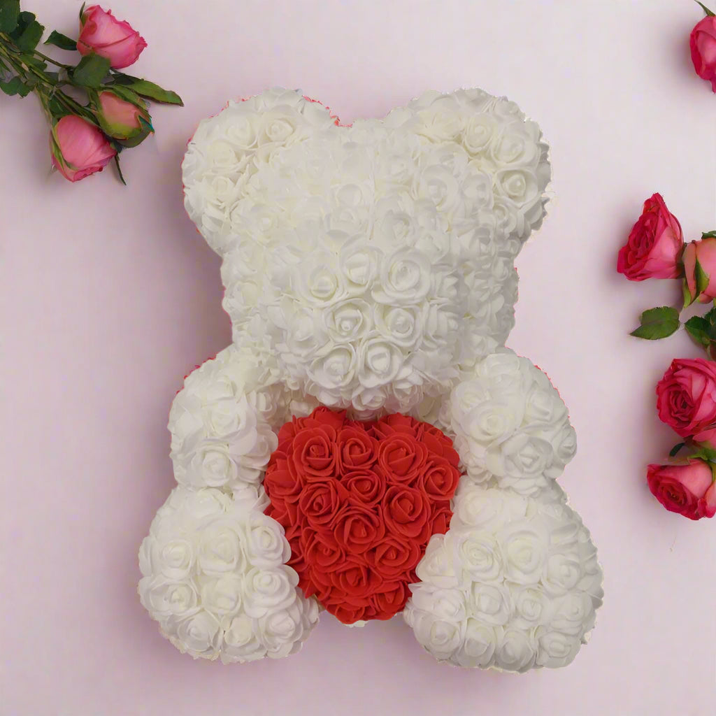 40cm red rose teddy bear with white heart inside clear display box
Handcrafted rose bear made from artificial foam roses
Romantic gift-ready rose bear in transparent packaging with red ribbon
Close-up of textured red and white foam roses on teddy bear
Elegant rose bear with heart-shaped center in deluxe gift box
Artificial rose teddy bear for Mother's Day, weddings, or anniversaries
Detailed shot of white heart roses on red floral teddy bear
Rose bear in clear gift box with red satin bow
Lux
