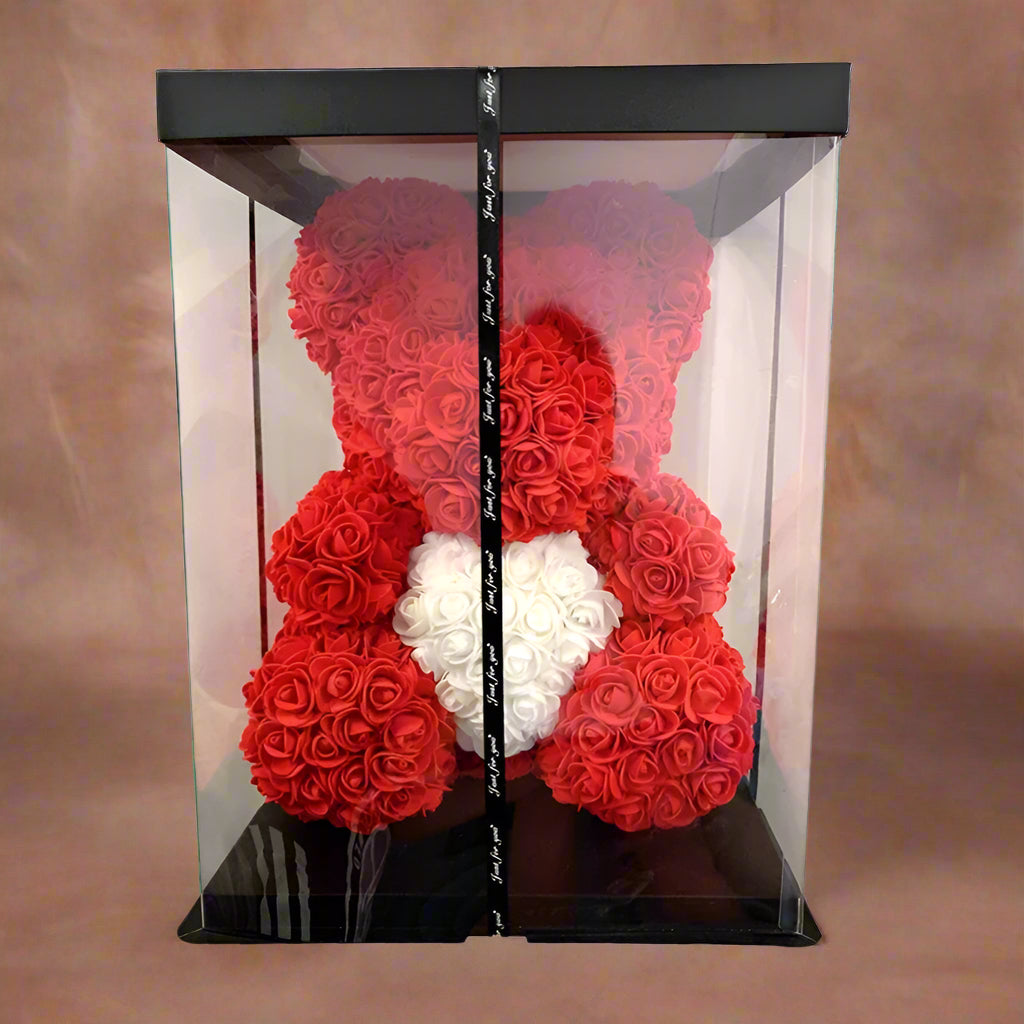 40cm red rose teddy bear with white heart inside clear display box
Handcrafted rose bear made from artificial foam roses
Romantic gift-ready rose bear in transparent packaging with red ribbon
Close-up of textured red and white foam roses on teddy bear
Elegant rose bear with heart-shaped center in deluxe gift box
Artificial rose teddy bear for Mother's Day, weddings, or anniversaries
Detailed shot of white heart roses on red floral teddy bear
Rose bear in clear gift box with red satin bow
Lux