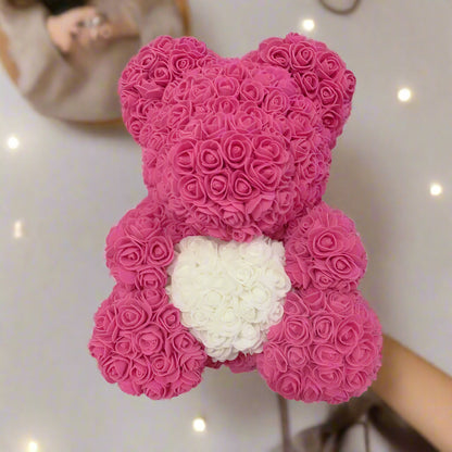 40cm red rose teddy bear with white heart inside clear display box  
Handcrafted rose bear made from artificial foam roses  
Romantic gift-ready rose bear in transparent packaging with red ribbon  
Close-up of textured red and white foam roses on teddy bear  
Elegant rose bear with heart-shaped center in deluxe gift box  
Artificial rose teddy bear for Mother's Day, weddings, or anniversaries  
Detailed shot of white heart roses on red floral teddy bear  
Rose bear in clear gift box with red satin bow  
Lux